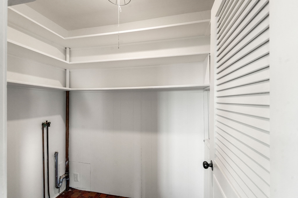 83 Fairhaven Road Mattapoisett, MA 02739 - Photo 16 of 41 a view of walk in closet with empty racks