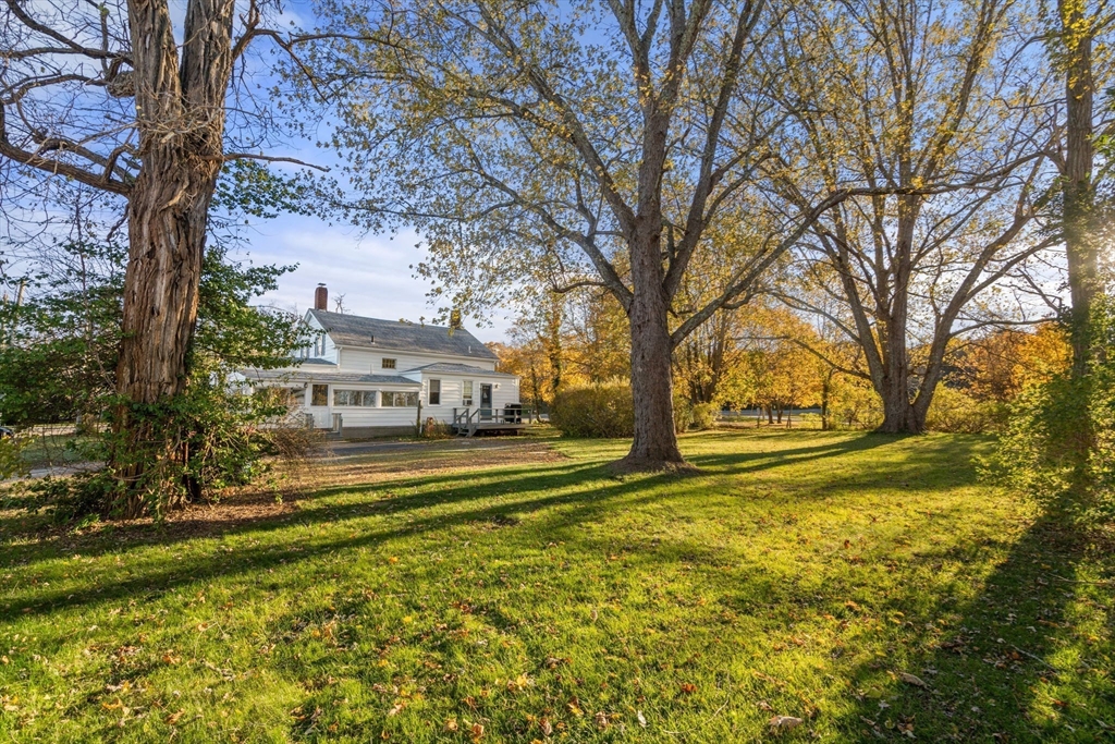 83 Fairhaven Road Mattapoisett, MA 02739 - Photo 2 of 41 a view of big yard with large trees