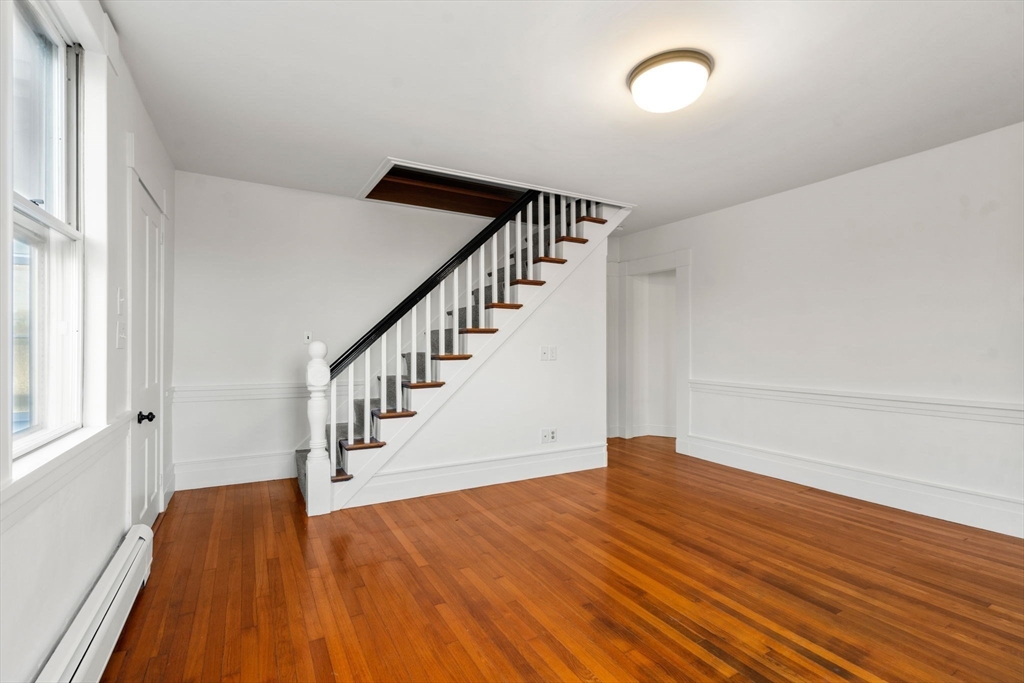 83 Fairhaven Road Mattapoisett, MA 02739 - Photo 22 of 41 a view of entryway and hall with wooden floor