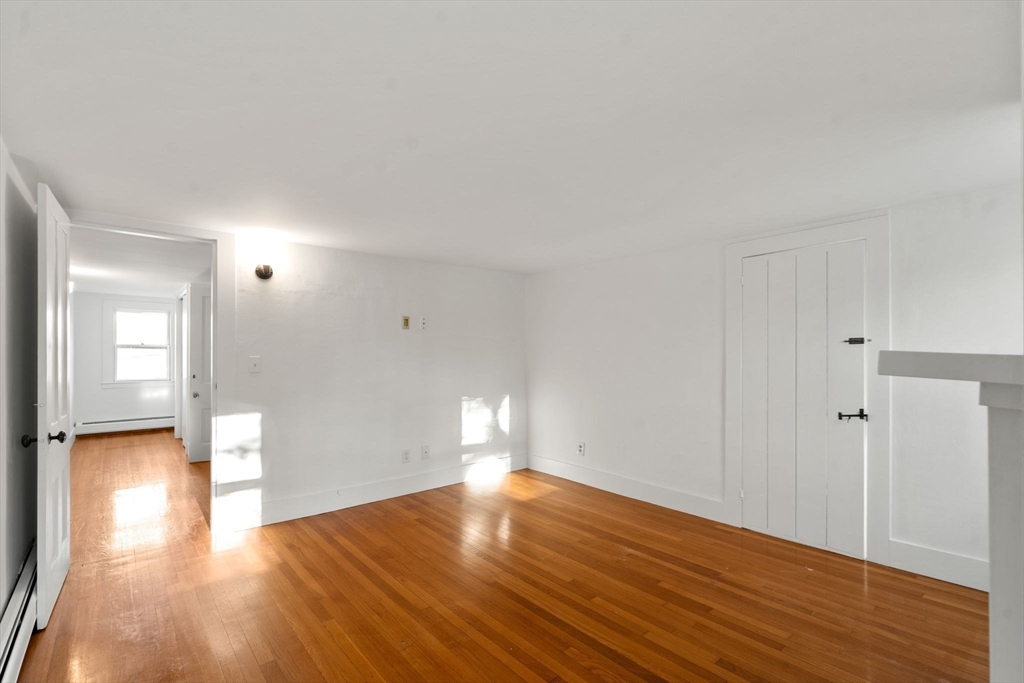 83 Fairhaven Road Mattapoisett, MA 02739 - Photo 25 of 41 a view of empty room with wooden floor