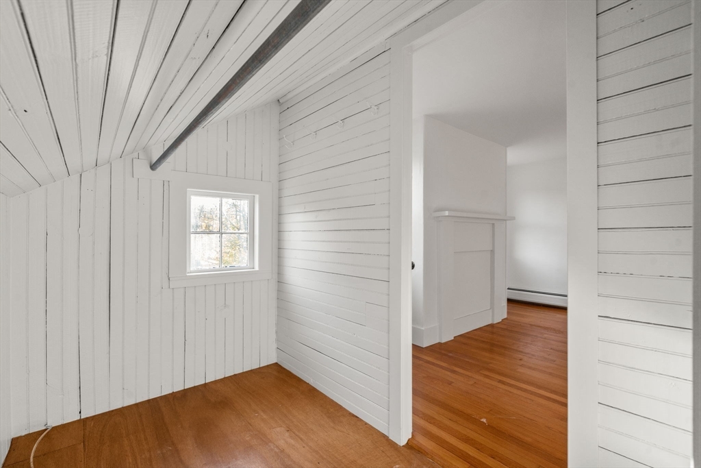 83 Fairhaven Road Mattapoisett, MA 02739 - Photo 26 of 41 wooden floor in an empty room with a window