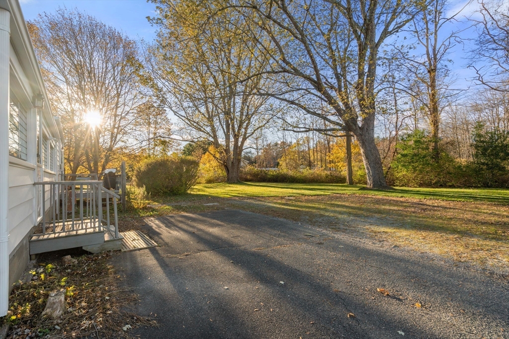 83 Fairhaven Road Mattapoisett, MA 02739 - Photo 32 of 41 a view of yard with large tree