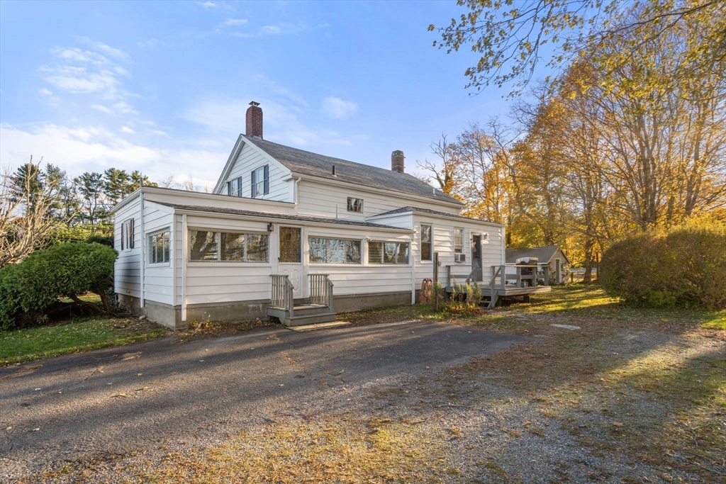 83 Fairhaven Road Mattapoisett, MA 02739 - Photo 33 of 41 a front view of a house with a yard