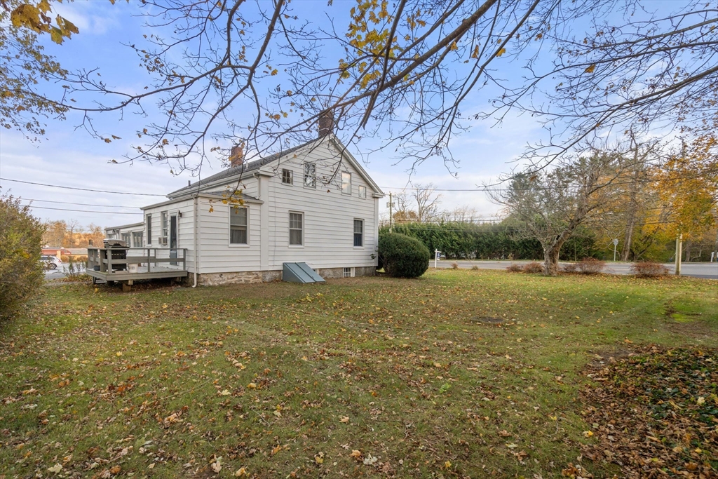 83 Fairhaven Road Mattapoisett, MA 02739 - Photo 36 of 41 a view of a house with a yard