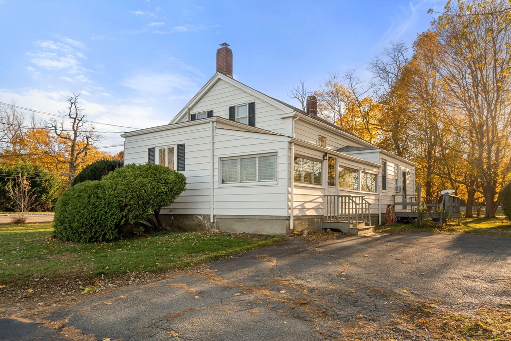 83 Fairhaven Road Mattapoisett, MA 02739 - Photo 39 of 41 a front view of a house with a yard