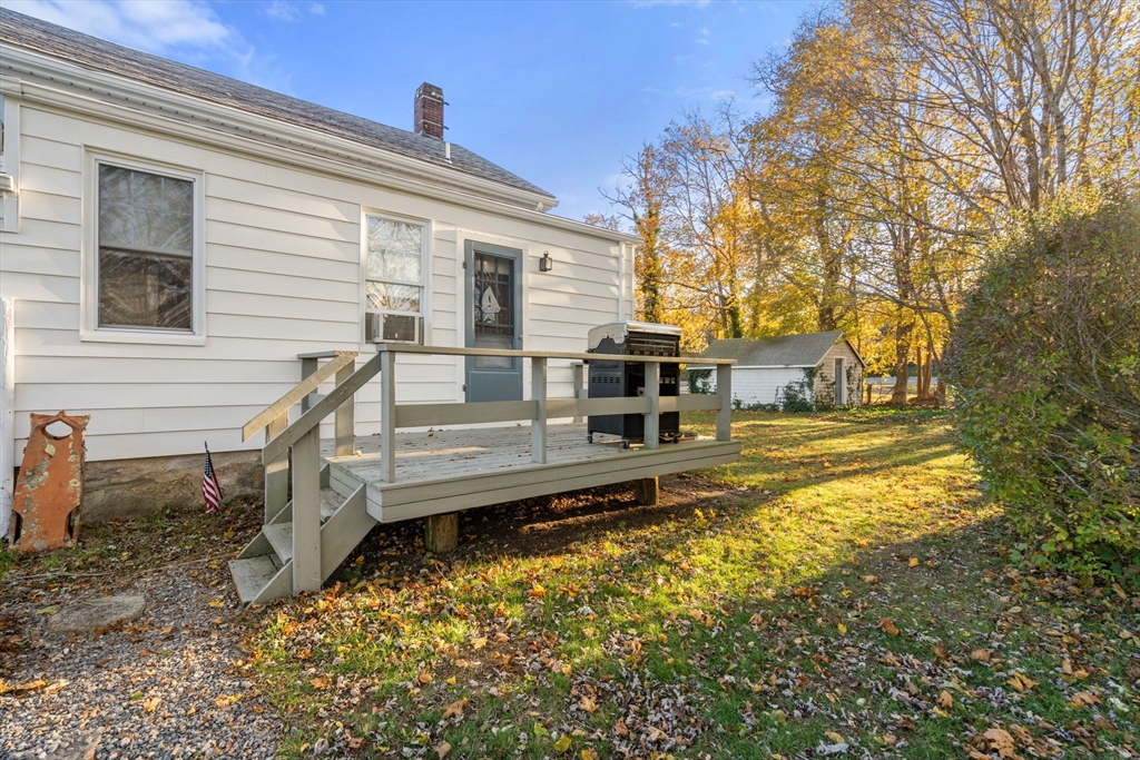83 Fairhaven Road Mattapoisett, MA 02739 - Photo 40 of 41 a view of a house with a yard