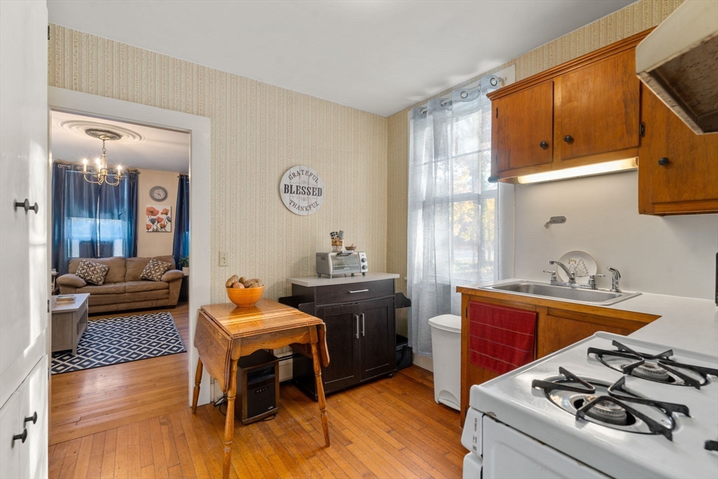 83 Fairhaven Road Mattapoisett, MA 02739 - Photo 7 of 41 a kitchen that has a table and chairs in it