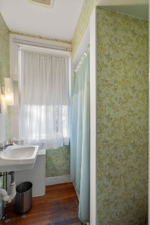 83 Fairhaven Road Mattapoisett, MA 02739 - Photo 9 of 41 a bathroom with a sink and a mirror