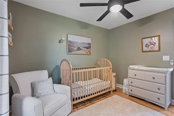a bedroom with furniture and a window