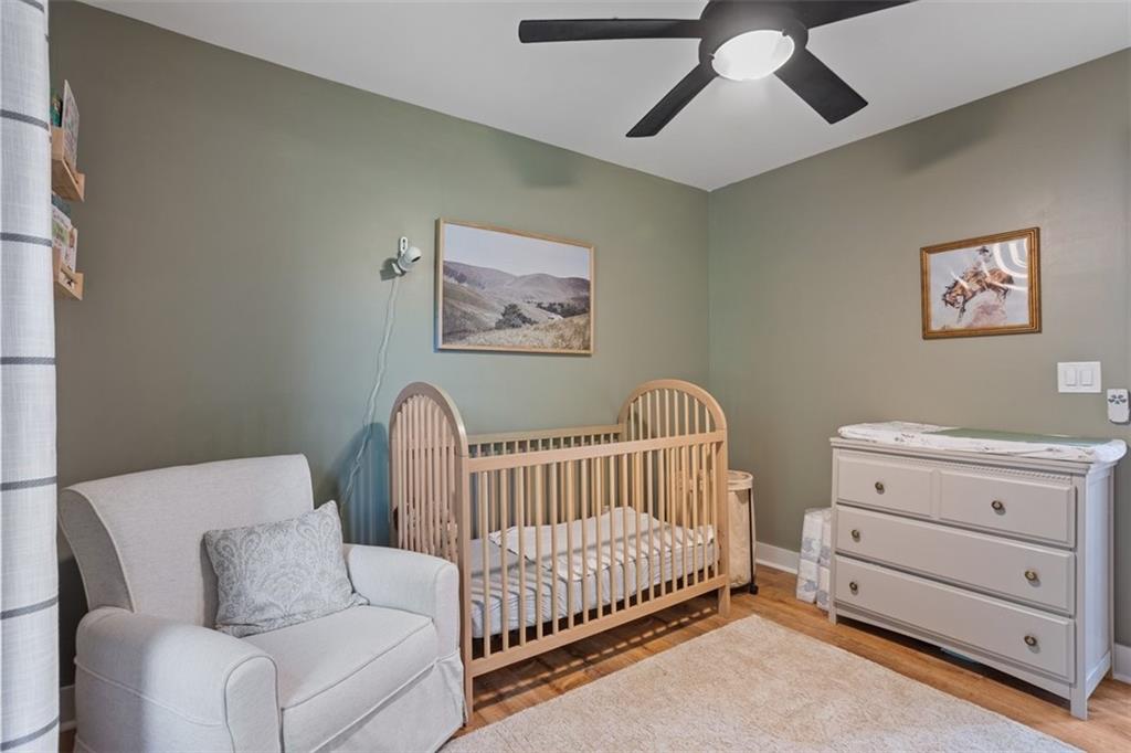 172 Jasper Street Fairmount, GA 30139 - Photo 19 of 32 a bedroom with furniture and a window
