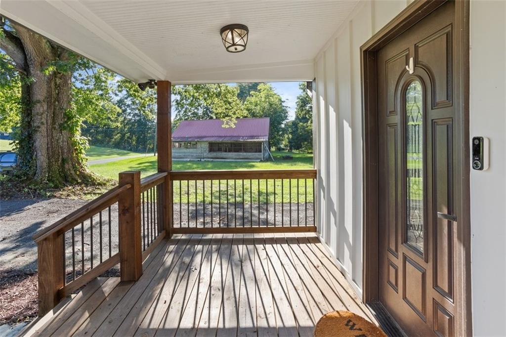 172 Jasper Street Fairmount, GA 30139 - Photo 23 of 32 a view of a two chairs in the balcony