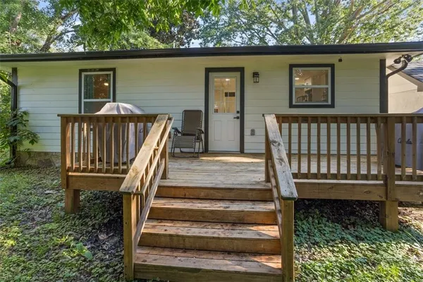 a view of entryway with a front door