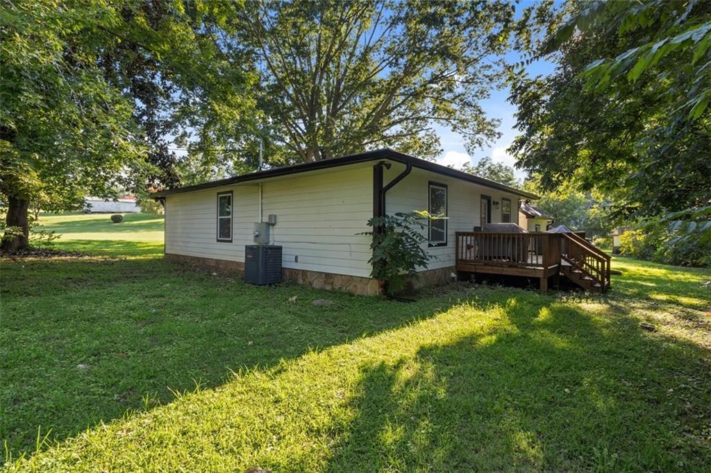 172 Jasper Street Fairmount, GA 30139 - Photo 27 of 32 a front view of house with yard and green space