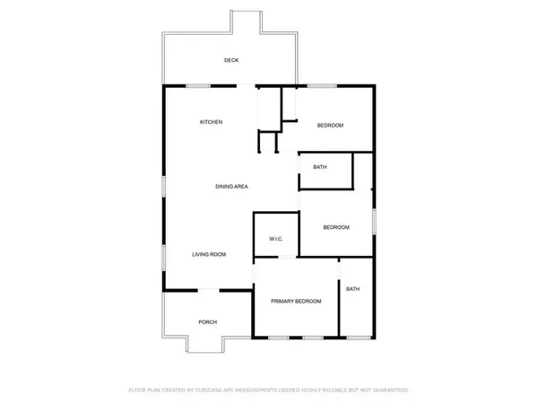 a picture of a bench in front of a building