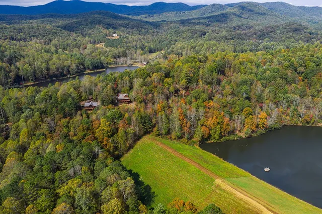 a view of a city and mountains in the background