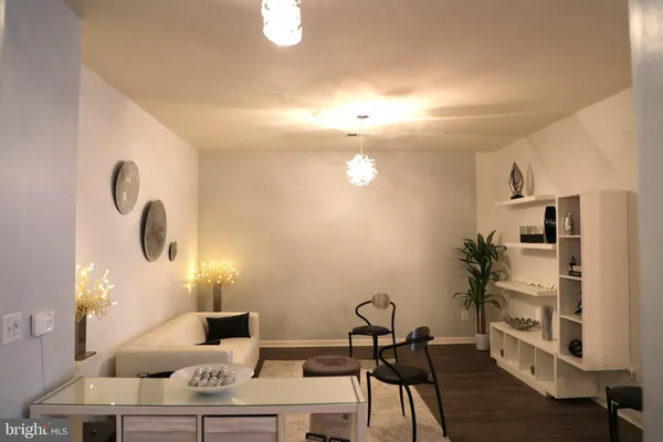 a view of a workspace with furniture