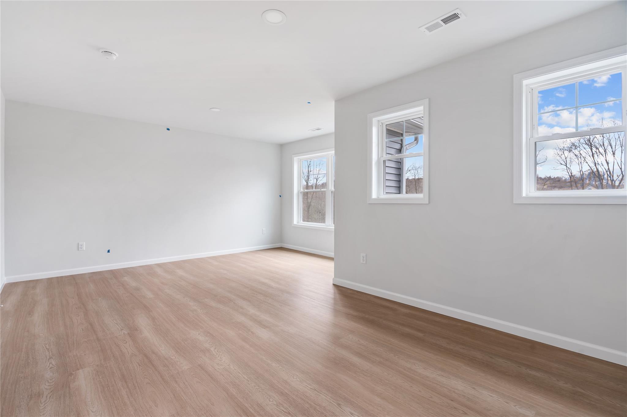 346 Old Hopewell Road Wappingers Falls, NY 12590 - Photo 32 of 42 a view of an empty room with wooden floor and window