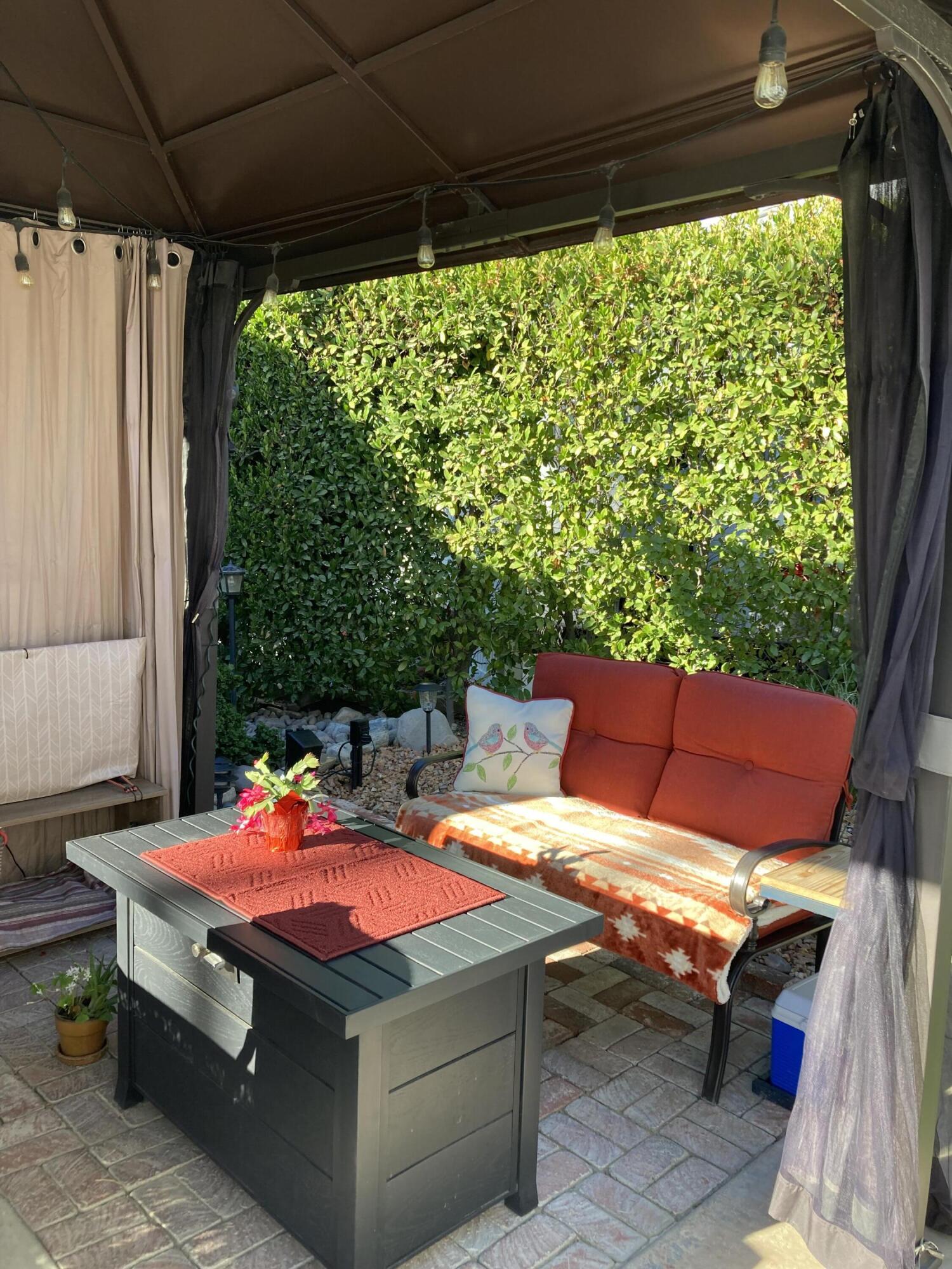 69411 Ramon Road, Unit 61 Cathedral City, CA 92234 - Photo 3 of 14 a outdoor space with a outdoor seating