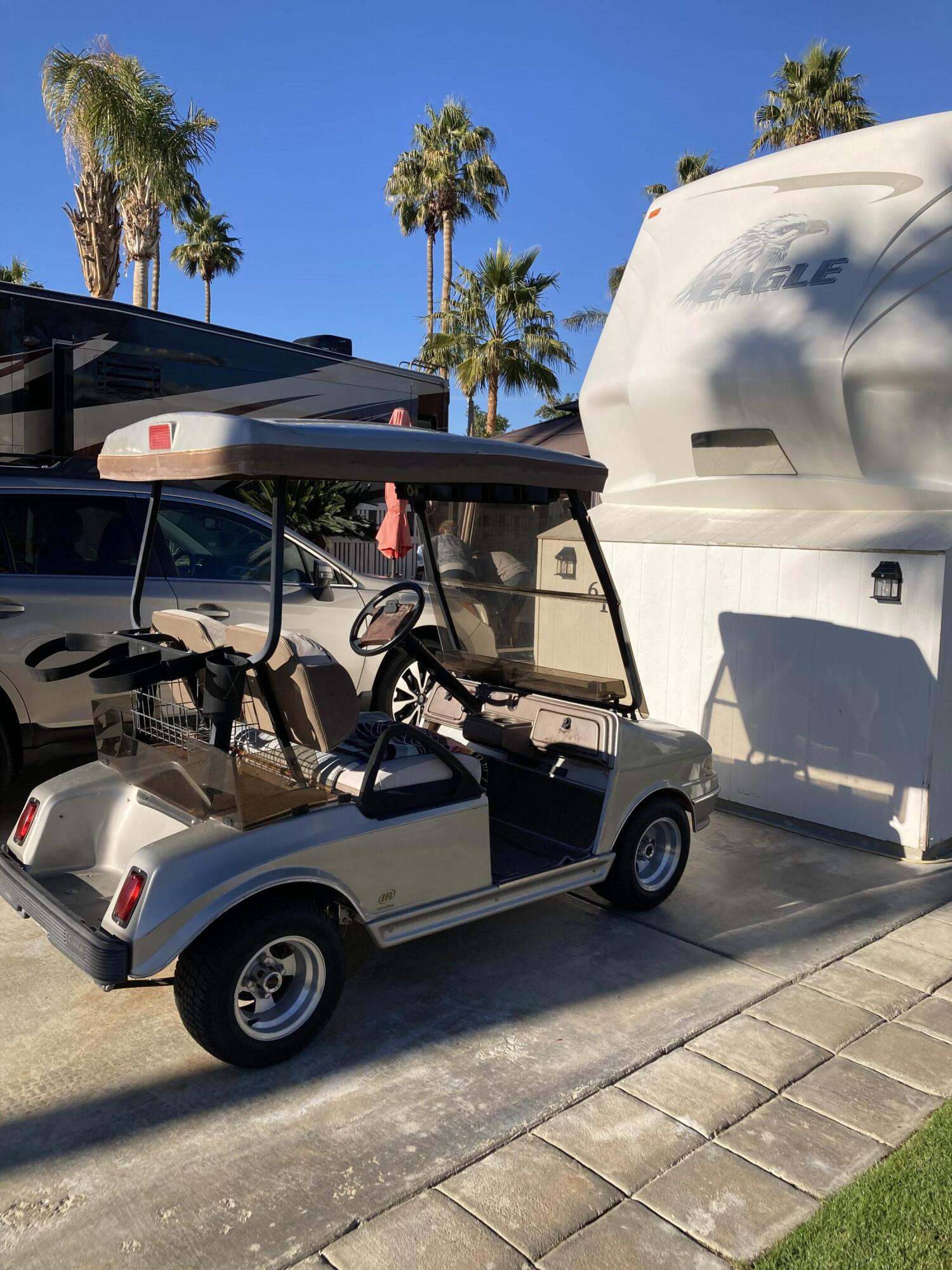 69411 Ramon Road, Unit 61 Cathedral City, CA 92234 - Photo 7 of 14 a car parked in a garage