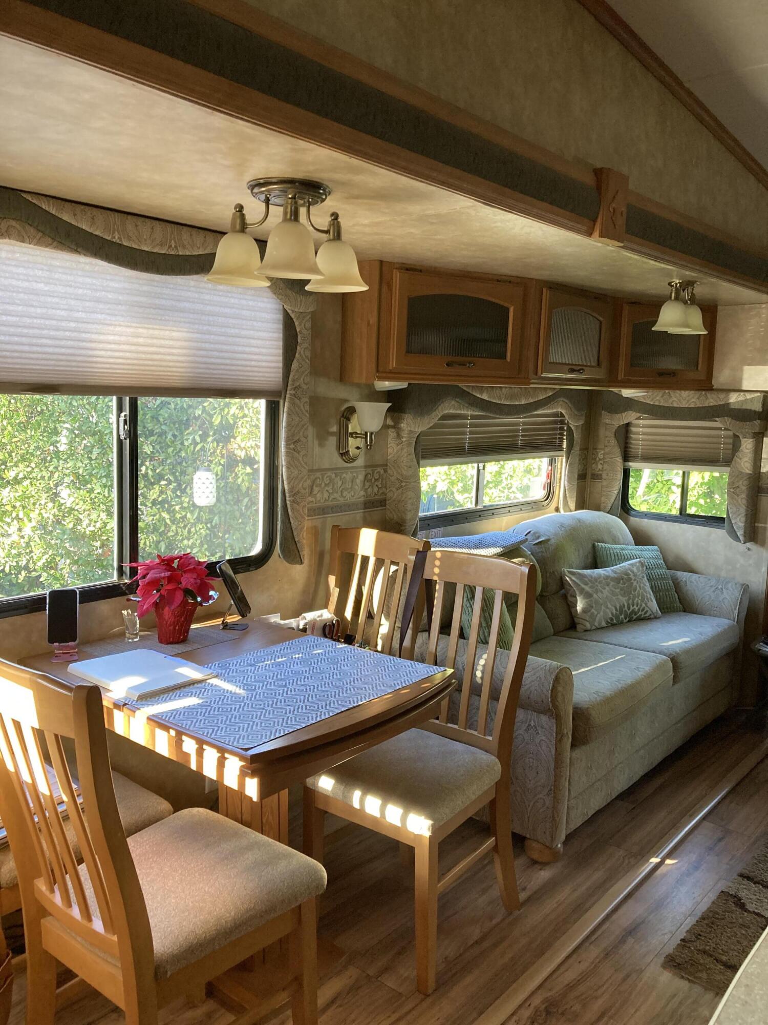 69411 Ramon Road, Unit 61 Cathedral City, CA 92234 - Photo 9 of 14 a view of a dining room with furniture window and outside view
