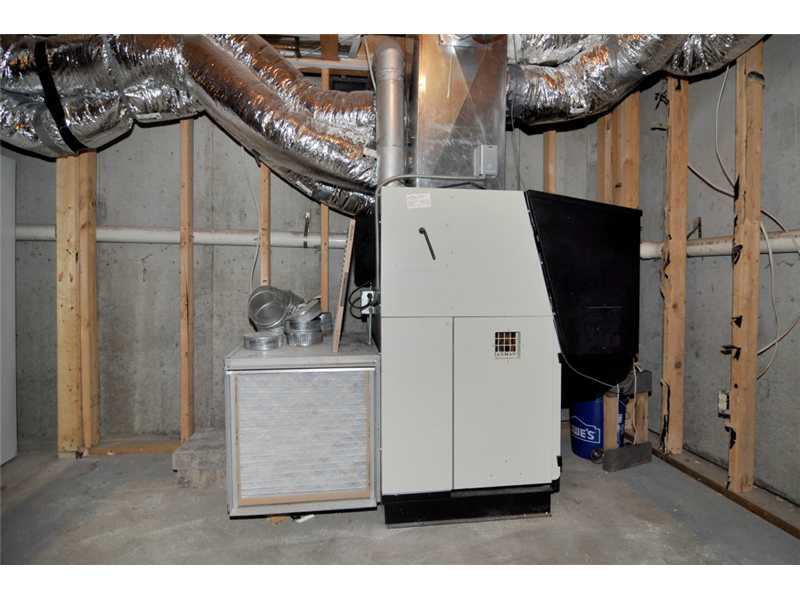 73 Charles Harpin Road Scituate, RI 02825 - Photo 21 of 24 Cellar or Basement. Energy Efficient Pellet Furnace heats the entire home providing a tremendous savings in heating costs!