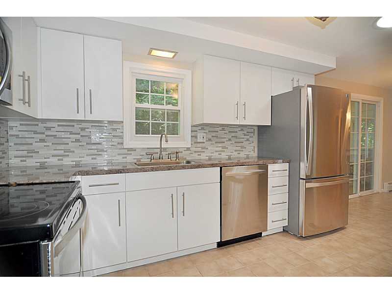 73 Charles Harpin Road Scituate, RI 02825 - Photo 3 of 24 Kitchen. Brand New kitchen with custom built cabinets, stainless steel appliances, and beautiful glass back splash.