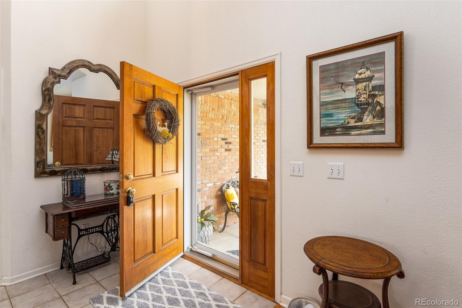 1082 Eldorado Drive Superior, CO 80027 - Photo 3 of 40 a view of hallway with furniture and a mirror