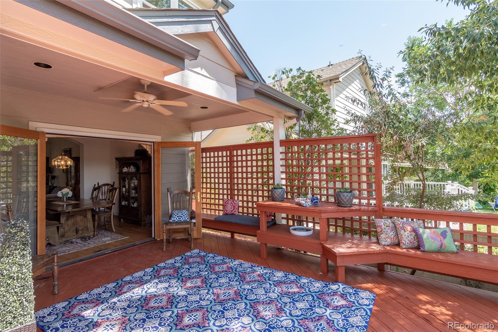 1082 Eldorado Drive Superior, CO 80027 - Photo 31 of 40 a balcony with furniture and wooden floor