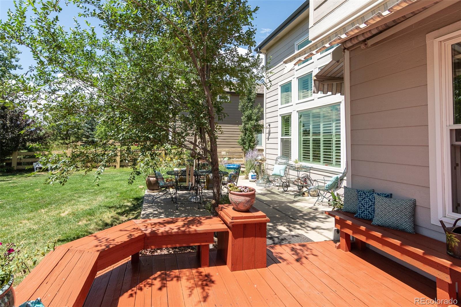 1082 Eldorado Drive Superior, CO 80027 - Photo 34 of 40 a backyard of a house with outdoor seating