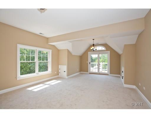 21 North Herbert Road, Unit J Riverside, IL 60546 - Photo 12 of 15 a view of an empty room with a window