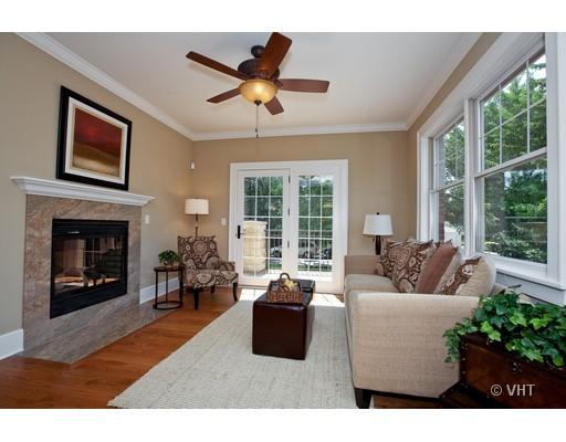 21 North Herbert Road, Unit J Riverside, IL 60546 - Photo 7 of 15 a living room with furniture and a fireplace