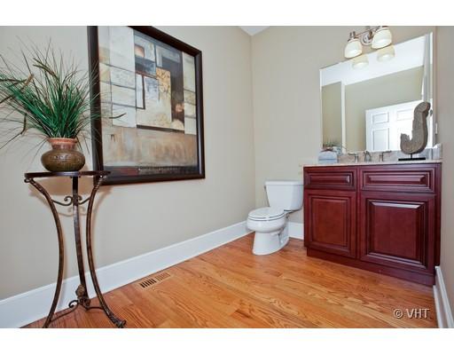 21 North Herbert Road, Unit J Riverside, IL 60546 - Photo 8 of 15 a view of bathroom with a toilet sink and mirror