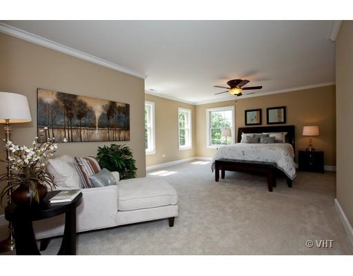 21 North Herbert Road, Unit J Riverside, IL 60546 - Photo 9 of 15 a bedroom with furniture and a window