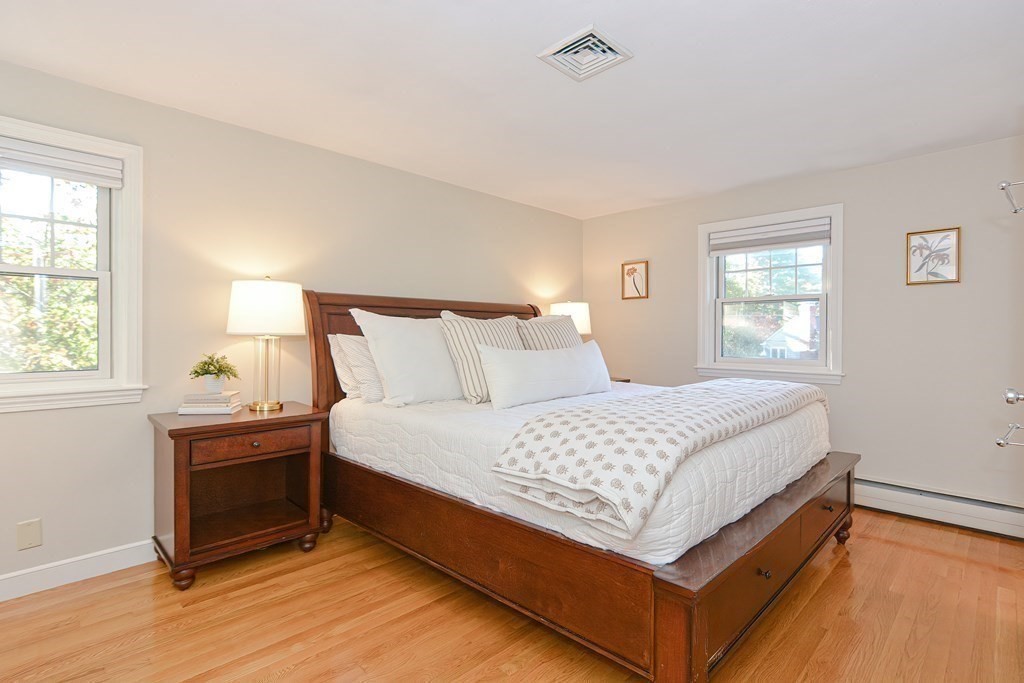 7 Tamarack Road Medfield, MA 02052 - Photo 13 of 33 a bedroom with a bed and window
