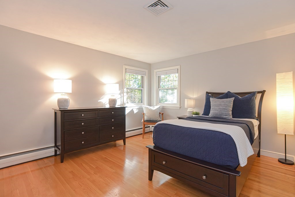 7 Tamarack Road Medfield, MA 02052 - Photo 16 of 33 a bed room with a bed and a window