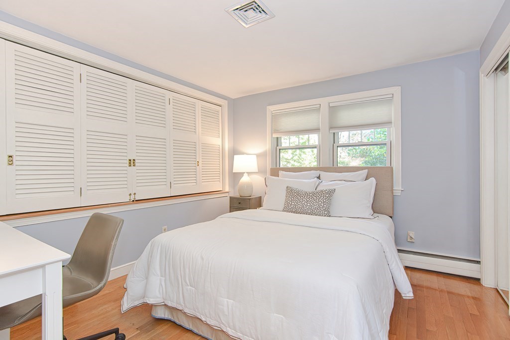 7 Tamarack Road Medfield, MA 02052 - Photo 18 of 33 a bedroom with a large bed and a large window