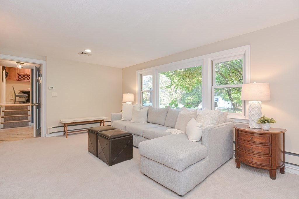 7 Tamarack Road Medfield, MA 02052 - Photo 22 of 33 a living room with furniture and a large window