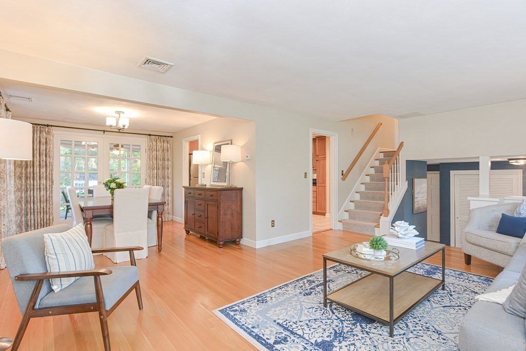 7 Tamarack Road Medfield, MA 02052 - Photo 7 of 33 a living room with furniture and a table