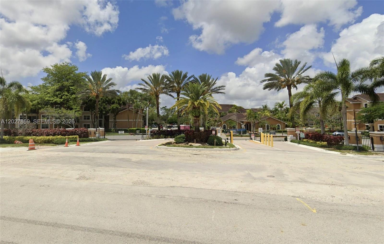 8761 Wiles Road, Unit 206 Coral Springs, FL 33067 - Photo 23 of 26 a view of road with a house in the background