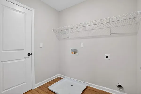 a view of a room with racks on the wall