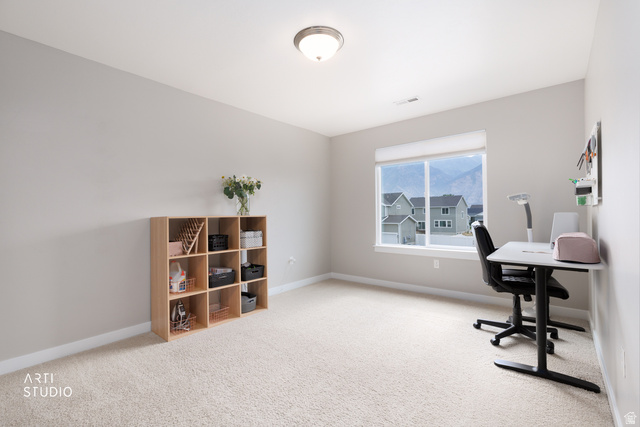 1654 South 730 West Provo, UT 84601 - Photo 14 of 33 Neutral tone walls and light-colored carpeting create a bright interior