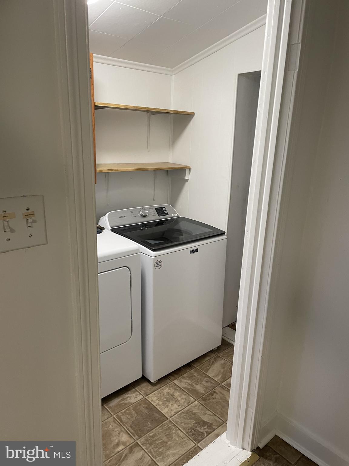 3530 Houston Branch Road Federalsburg, MD 21632 - Photo 16 of 20 a utility room with wooden floor washer and dryer