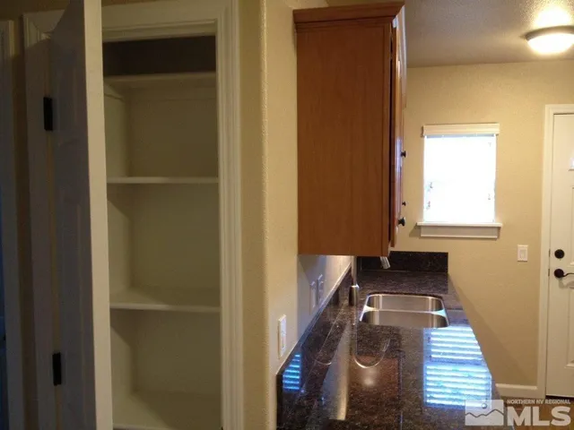 a kitchen with a stove and a microwave