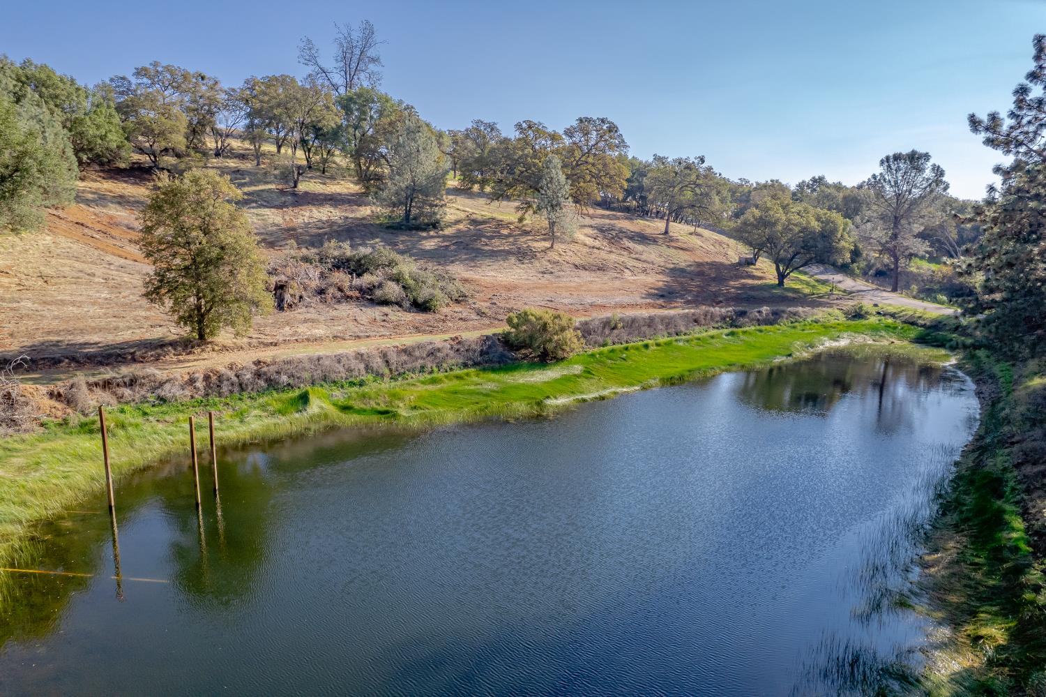 5585 Garden Bar Road Lincoln, CA 95648 - Photo 2 of 27 a view of a lake with houses