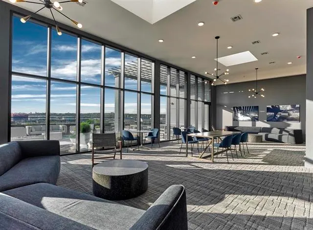 a terrace with a table and chairs