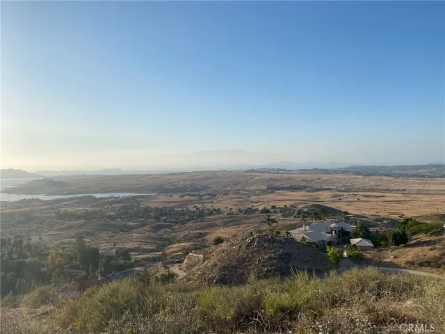an aerial view of residential building and ocean