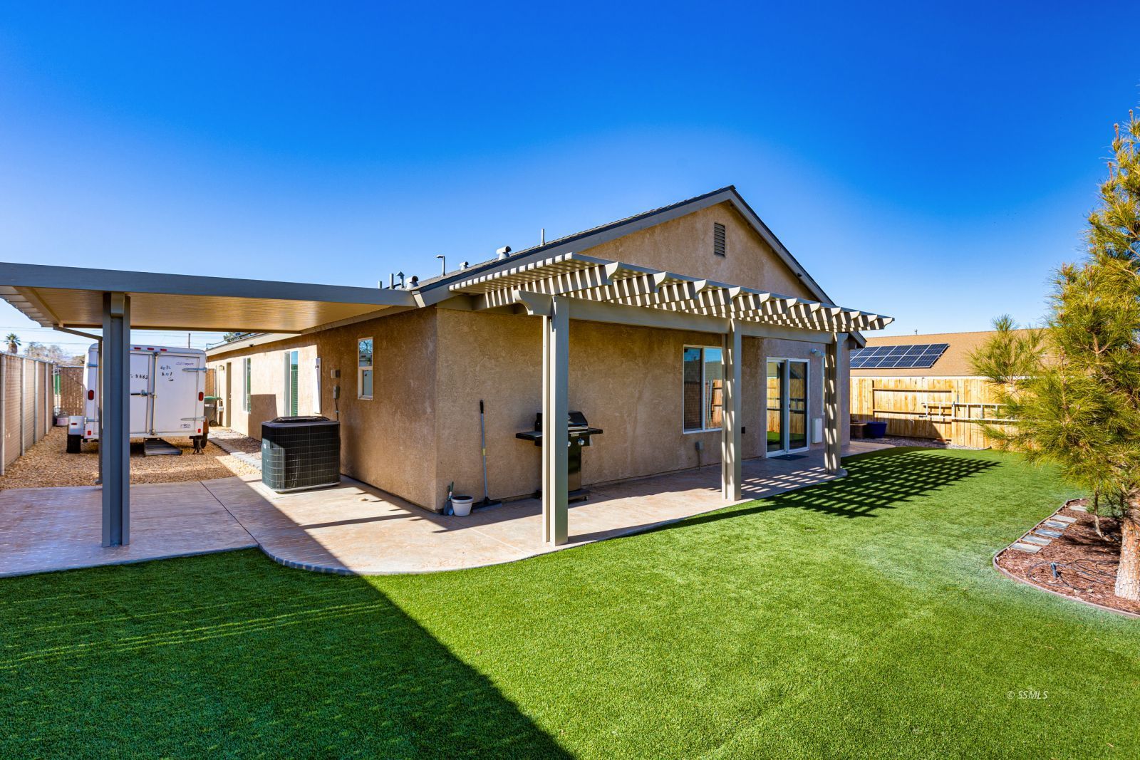 1200 South McCall Street Ridgecrest, CA 93555 - Photo 26 of 30 a view of a house with a yard and porch