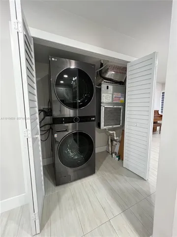a utility room with a washer and dryer