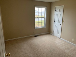 203 Ruf Drive Oak Grove, KY 42262 - Photo 6 of 10 an empty room with windows