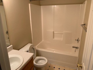 203 Ruf Drive Oak Grove, KY 42262 - Photo 7 of 10 a bathroom with a toilet and a bathtub